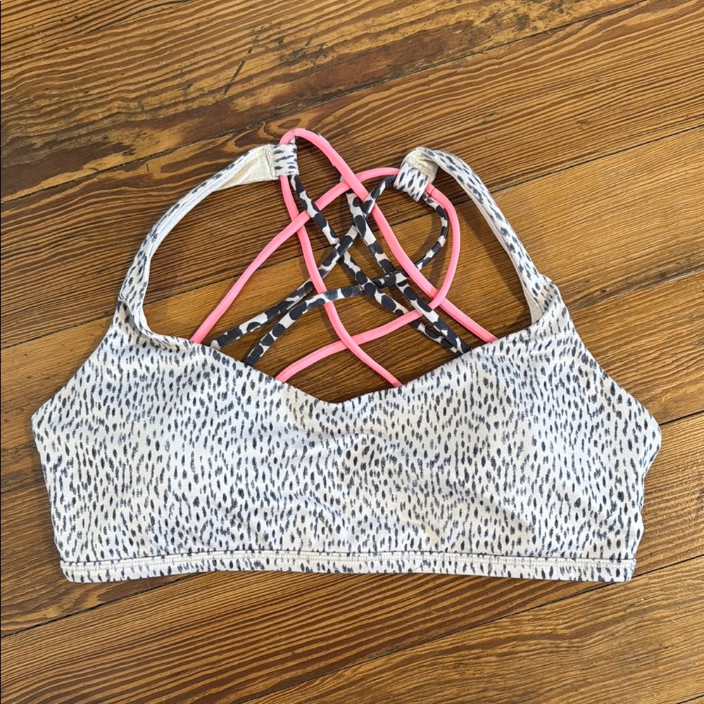 Chic Black and Pink Strappy Sports Bra